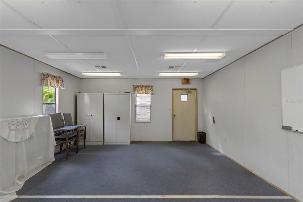 17500 Marsh Road Lutz, FL 33558 - Photo 63 of 80 a view of a livingroom with furniture and windows