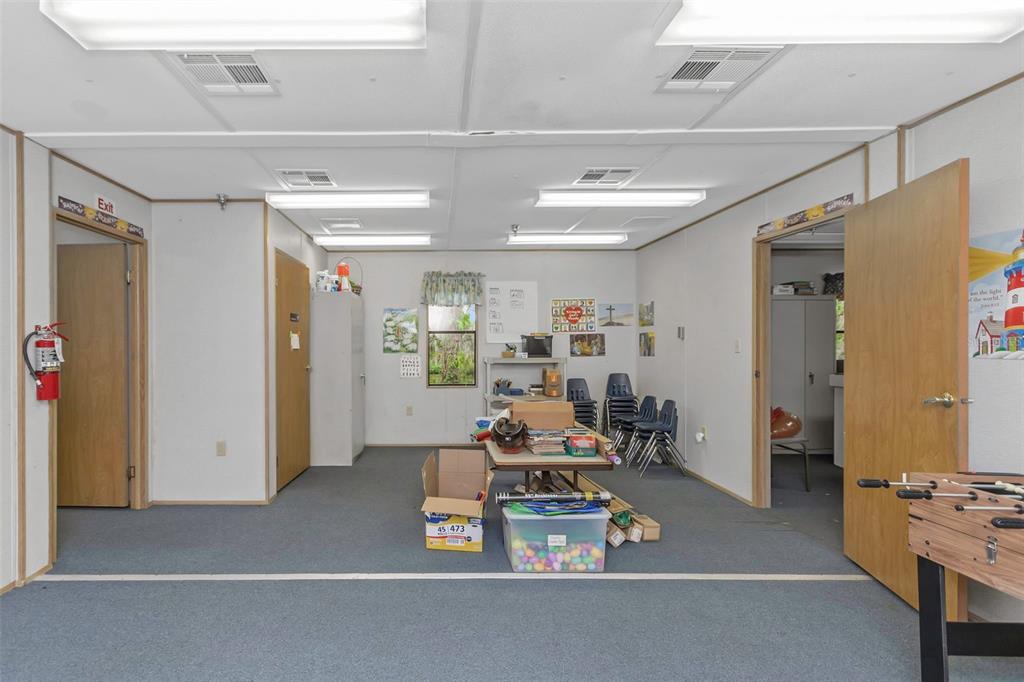 17500 Marsh Road Lutz, FL 33558 - Photo 73 of 80 a living room with furniture and a window