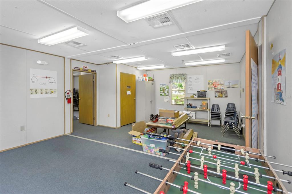 17500 Marsh Road Lutz, FL 33558 - Photo 74 of 80 a room with furniture and gym equipment