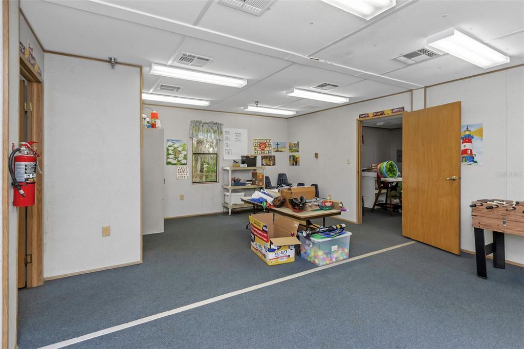 17500 Marsh Road Lutz, FL 33558 - Photo 75 of 80 a living room with furniture and a couch