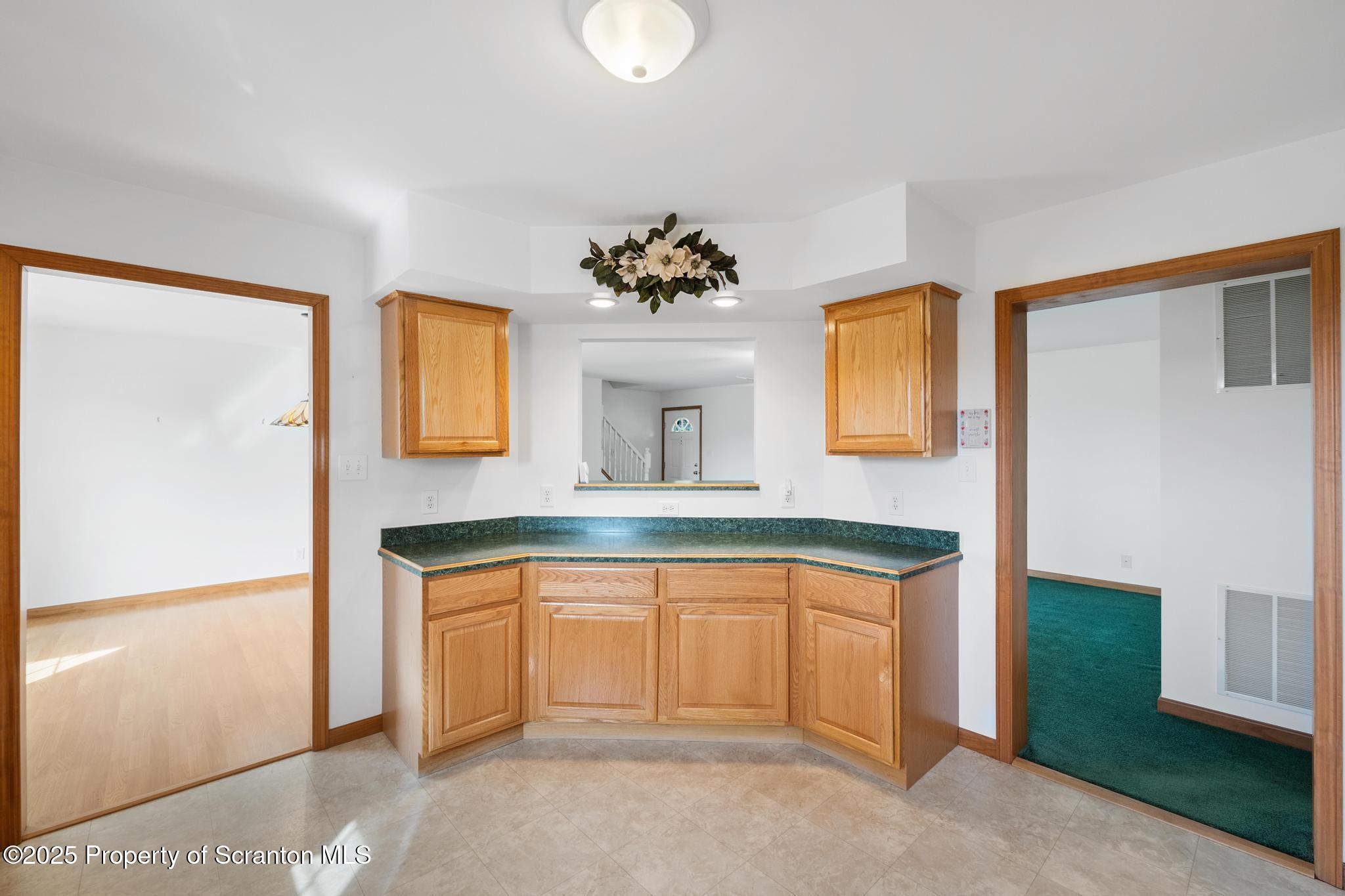 1336 Bush Road Montrose, PA 18801 - Photo 12 of 55 a kitchen with a sink cabinets and a window