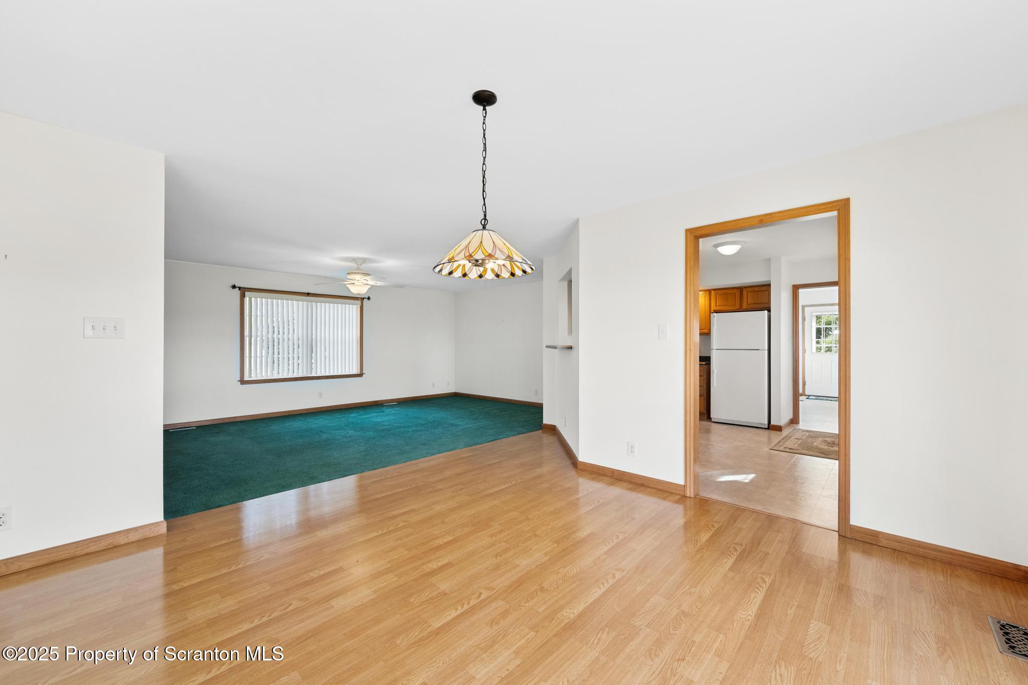 1336 Bush Road Montrose, PA 18801 - Photo 14 of 55 a view of an empty room with wooden floor and a window