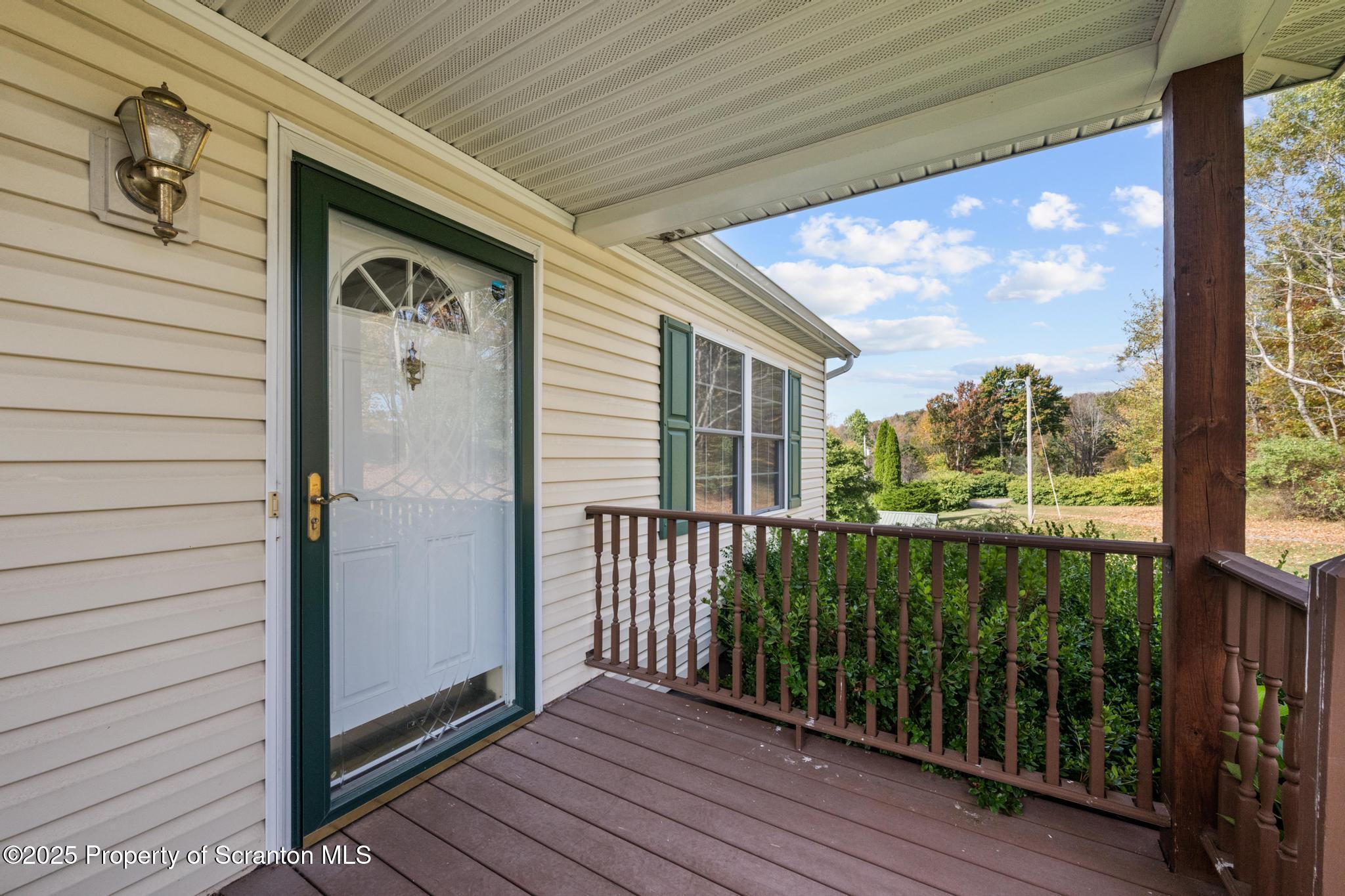 1336 Bush Road Montrose, PA 18801 - Photo 46 of 55 a view of a porch with wooden floor