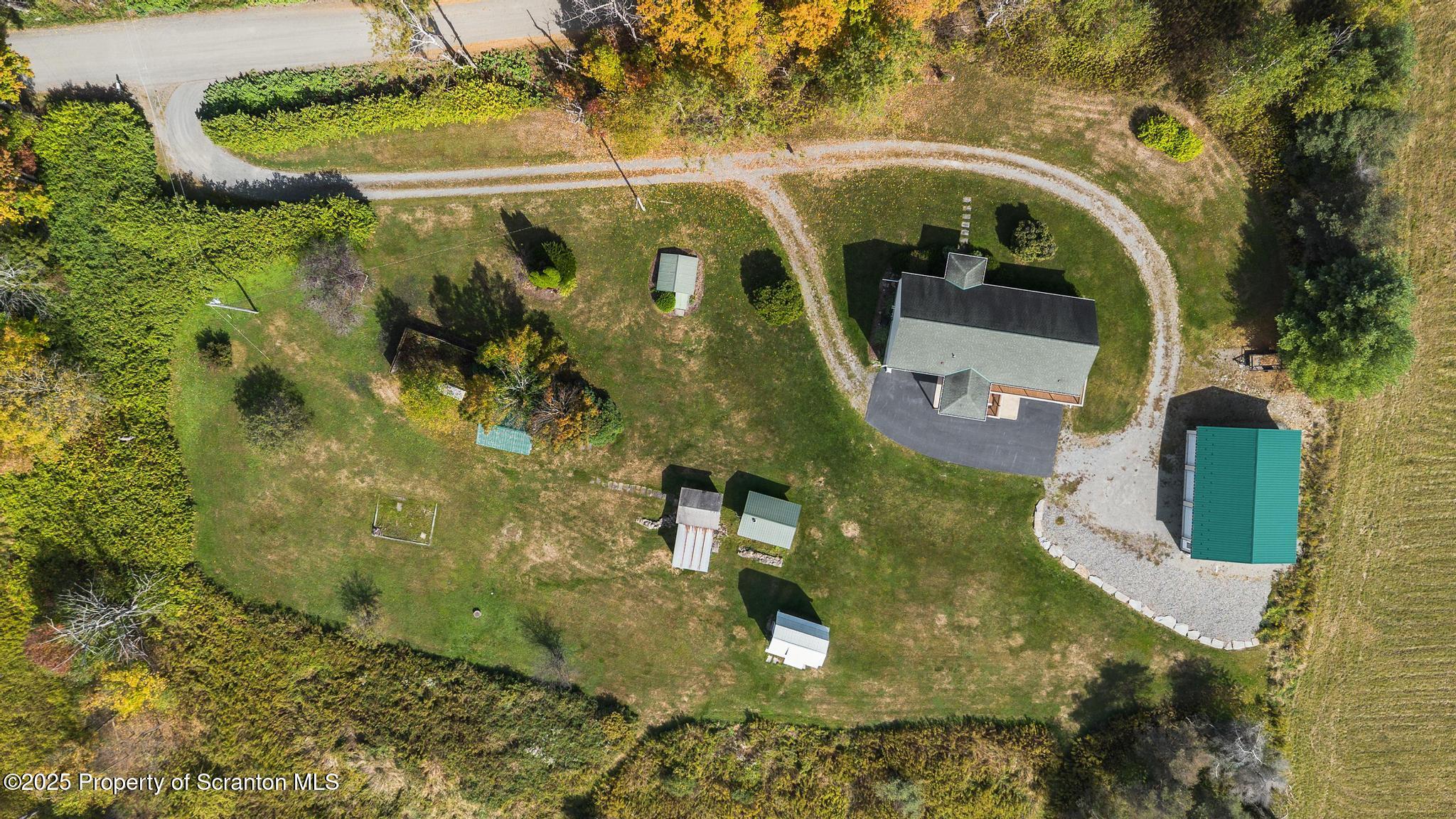 1336 Bush Road Montrose, PA 18801 - Photo 52 of 55 an aerial view of residential house with outdoor space and swimming pool