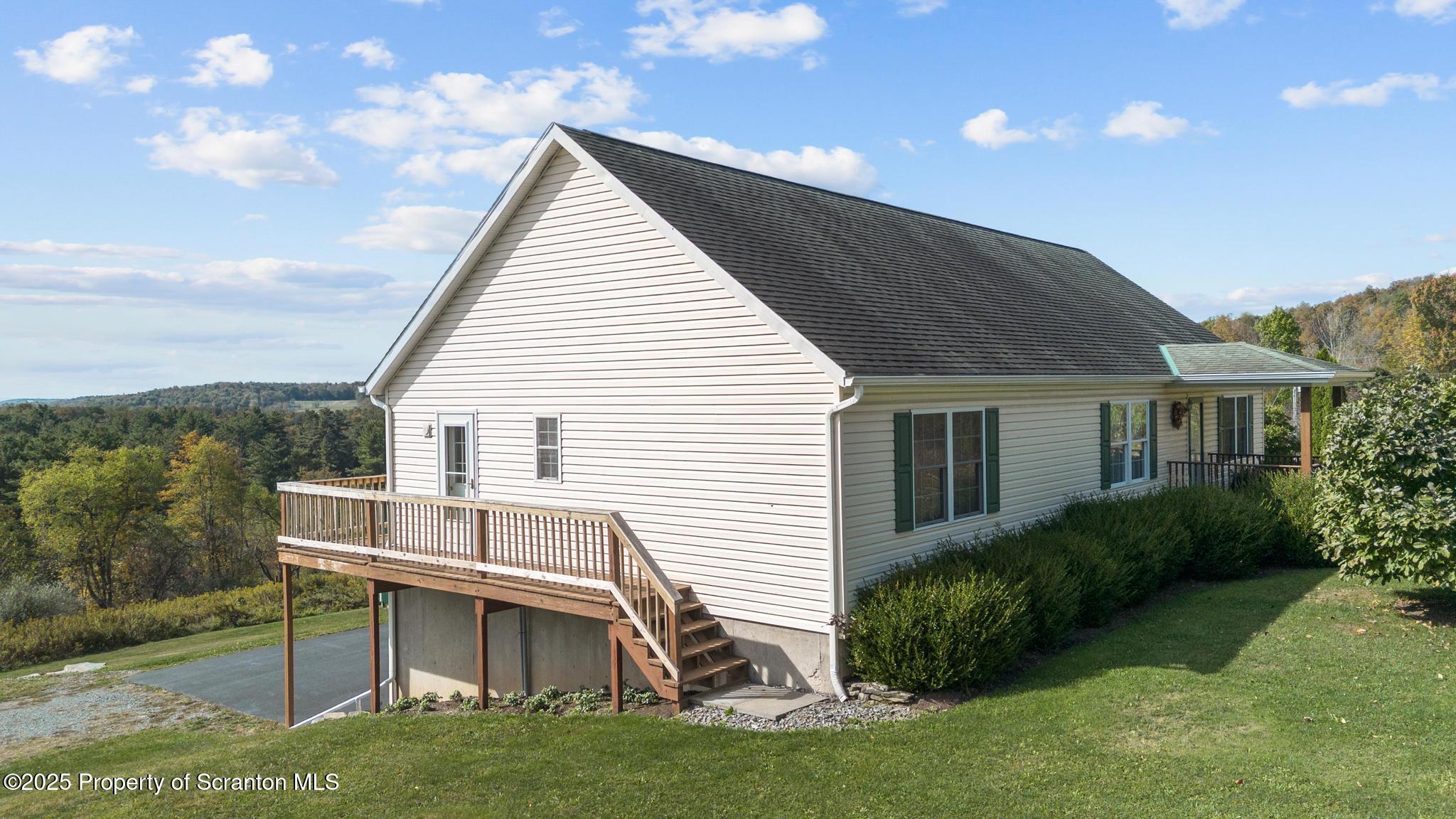 1336 Bush Road Montrose, PA 18801 - Photo 55 of 55 a view of house with a yard