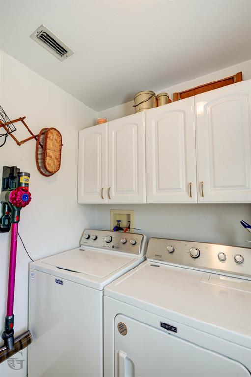 8835 Sebastian Road Keithville, LA 71047 - Photo 11 of 21 White cabinetry with polished hardware