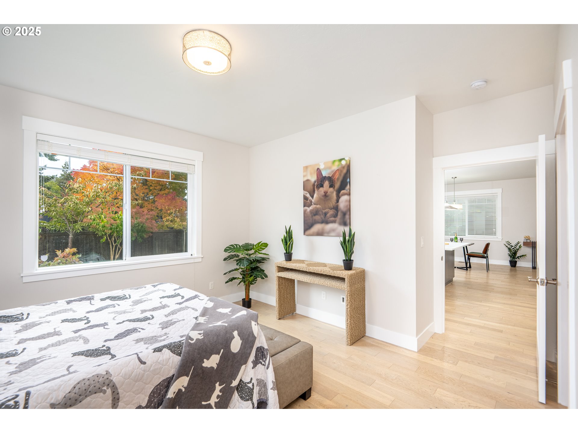 2355 Pioneer Pike Eugene, OR 97401 - Photo 20 of 29 a bedroom with a bed and a large window