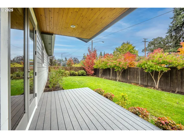 a view of a backyard with garden