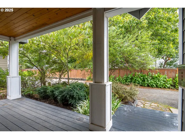 a view of a backyard of the house