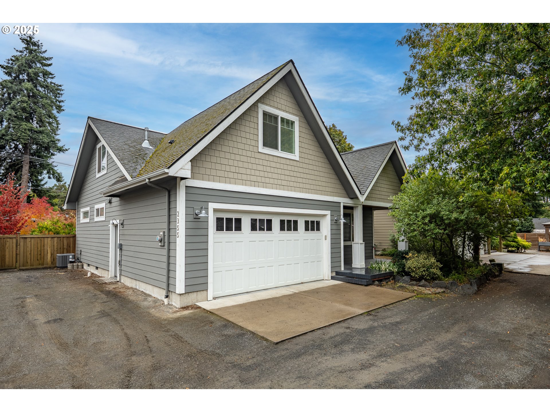 2355 Pioneer Pike Eugene, OR 97401 - Photo 27 of 29 a front view of a house with a garage