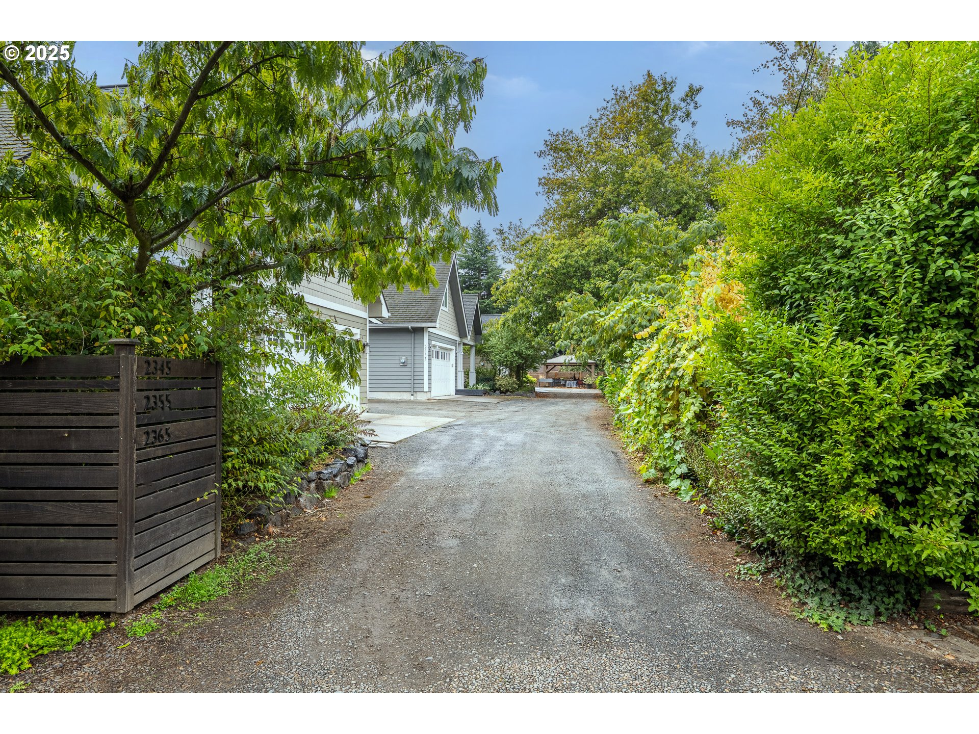 2355 Pioneer Pike Eugene, OR 97401 - Photo 29 of 29 a view of a yard with plants and a bench
