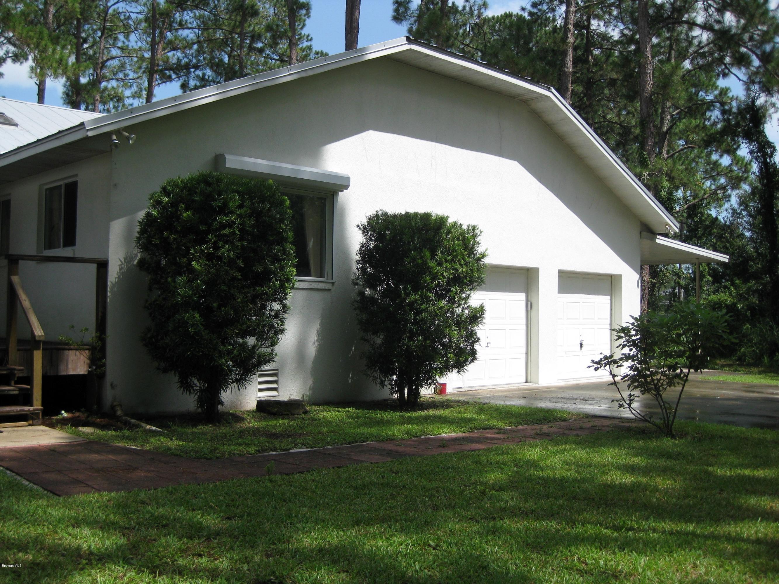 2015 Turpentine Road Mims, FL 32754 - Photo 21 of 22 2 car garage & Rolladens