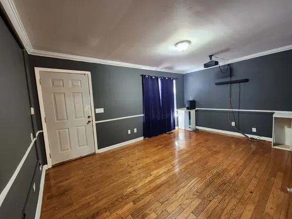 a view of a livingroom with a furniture