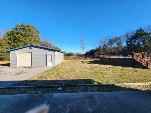 a view of outdoor space yard and swimming pool