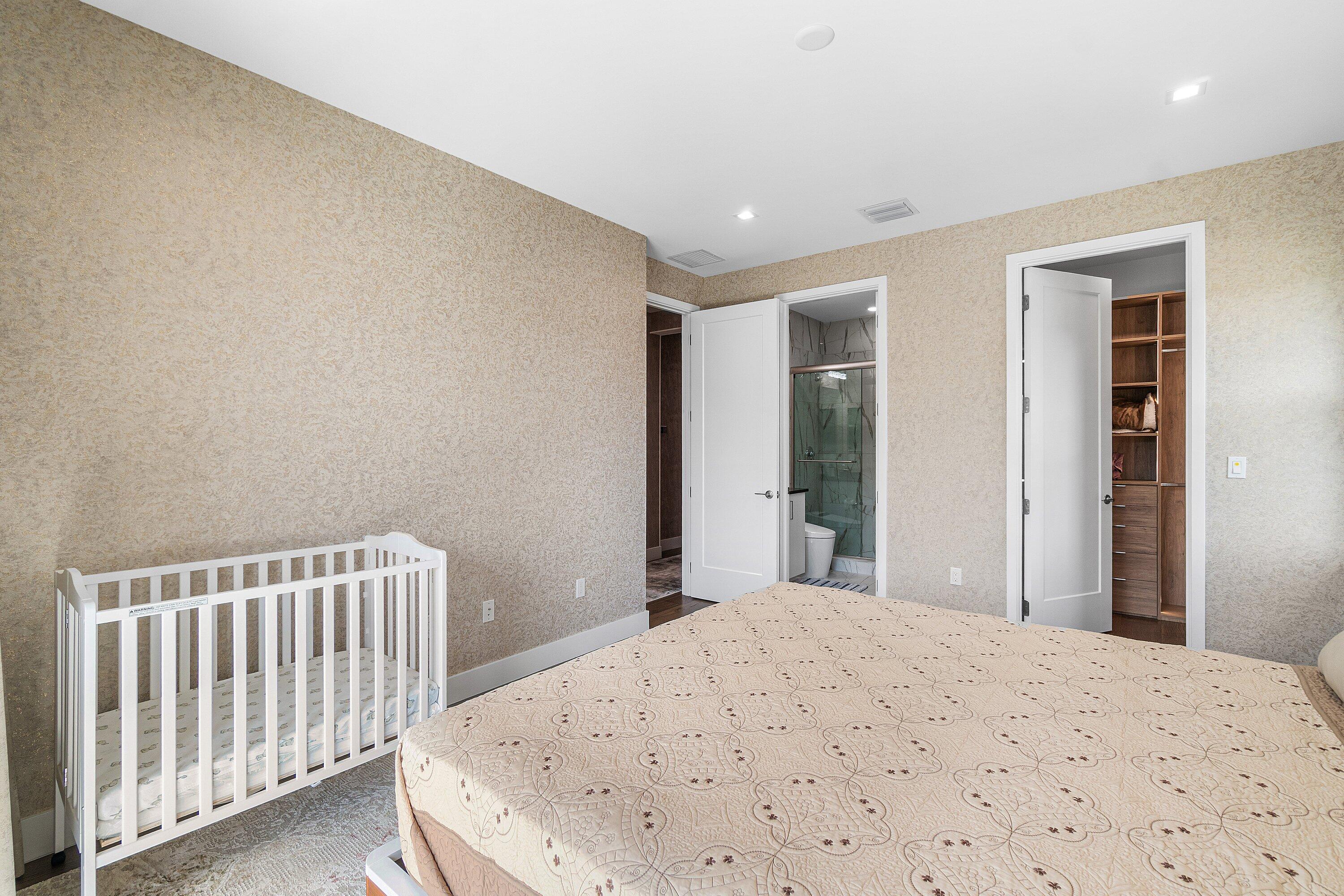 8233 Crystal Downs Avenue Boca Raton, FL 33434 - Photo 42 of 58 a bedroom with a bed and a window