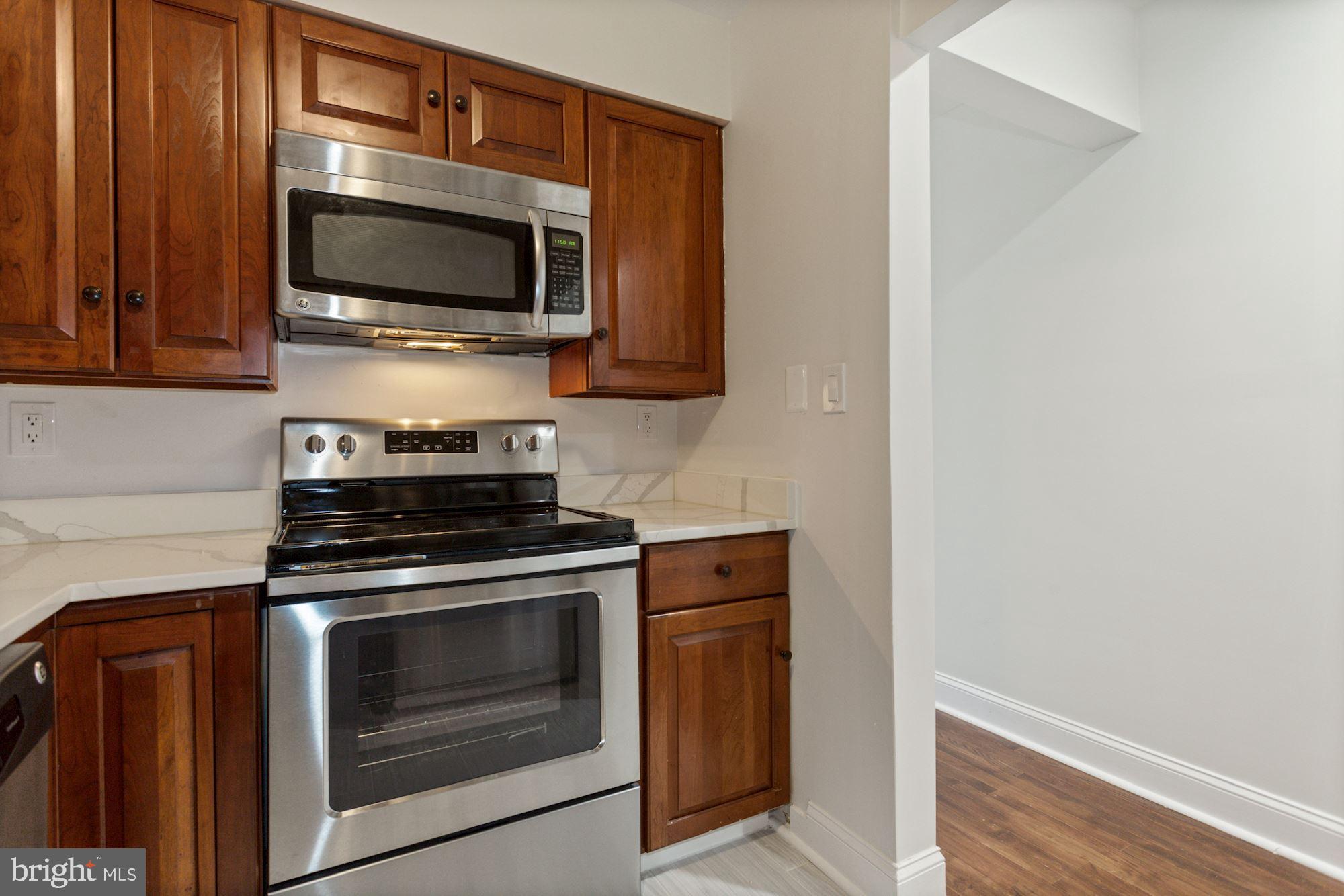 1230 31st Street Northwest, Unit 6 Washington, DC 20007 - Photo 12 of 27 Renovated kitchen with new appliances