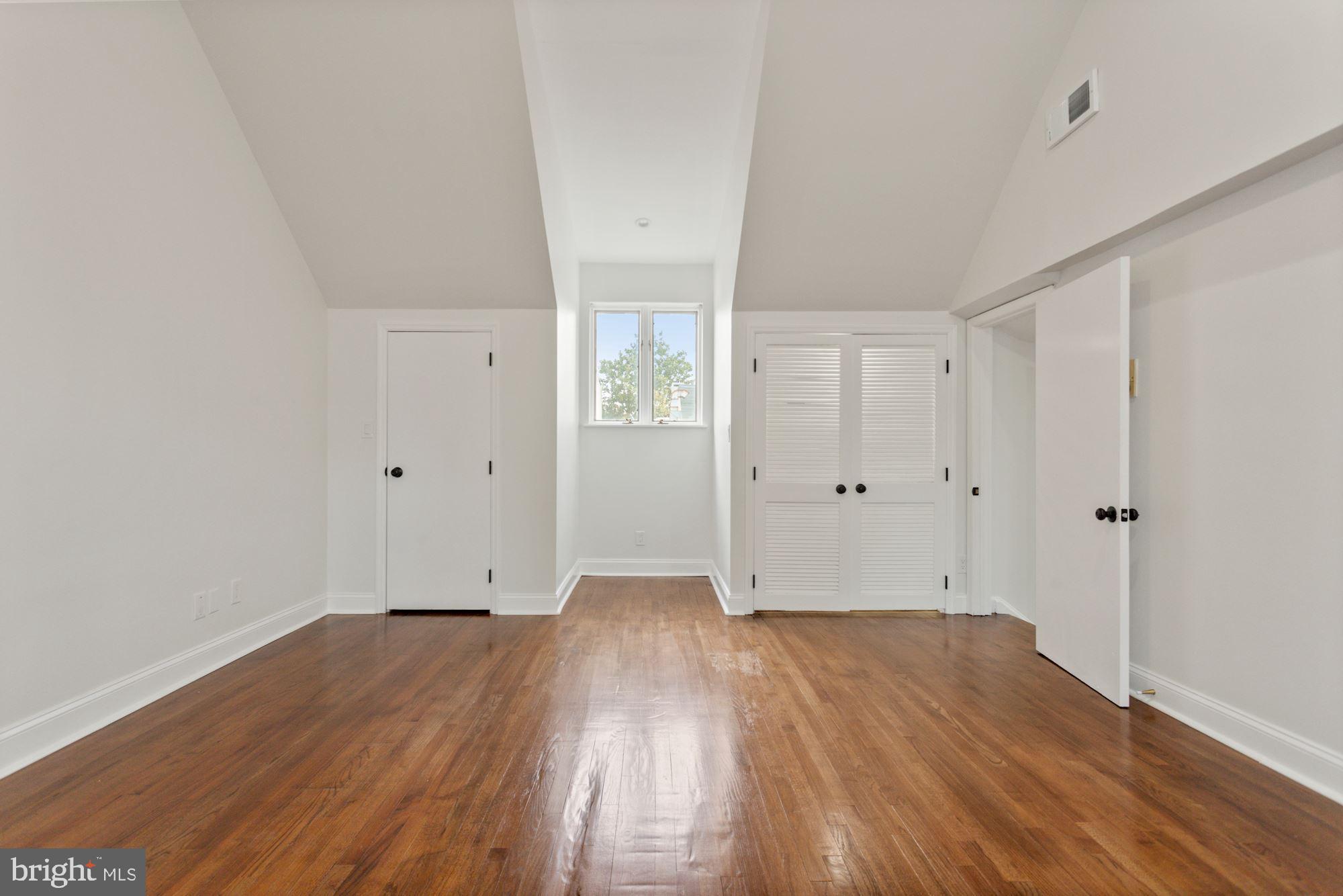 1230 31st Street Northwest, Unit 6 Washington, DC 20007 - Photo 18 of 27 Very large bedroom with vaulted ceiling