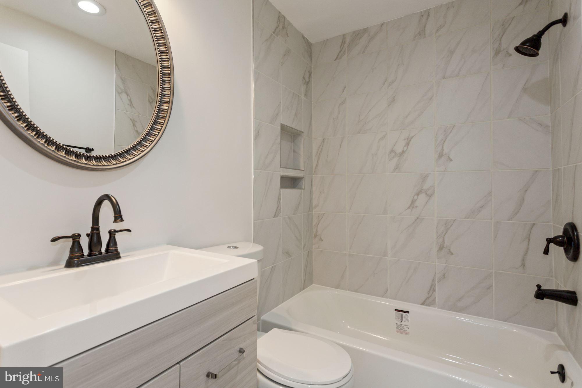 1230 31st Street Northwest, Unit 6 Washington, DC 20007 - Photo 23 of 27 Freshly renovated bathroom