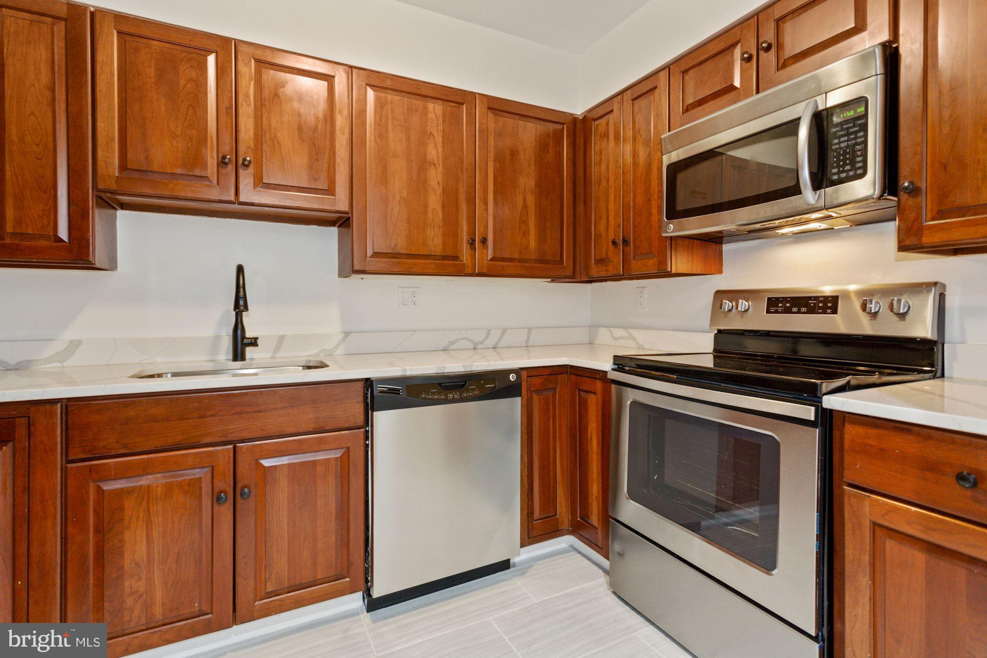 1230 31st Street Northwest, Unit 6 Washington, DC 20007 - Photo 10 of 27 Renovated kitchen with new appliances