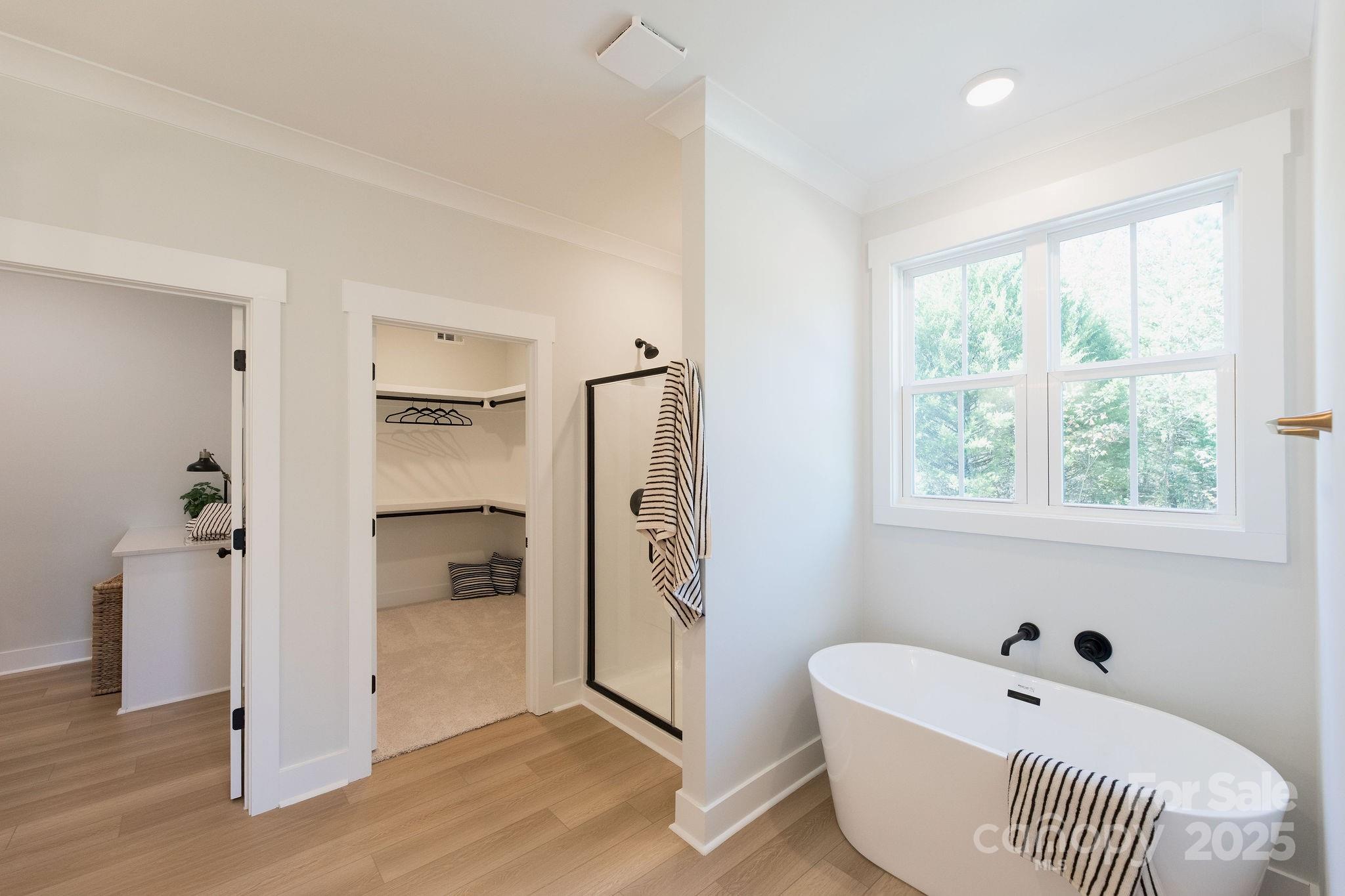 3046 Meadowcrest Drive, Unit 69 Clover, SC 29710 - Photo 15 of 42 a bathroom with a bathtub and a shower