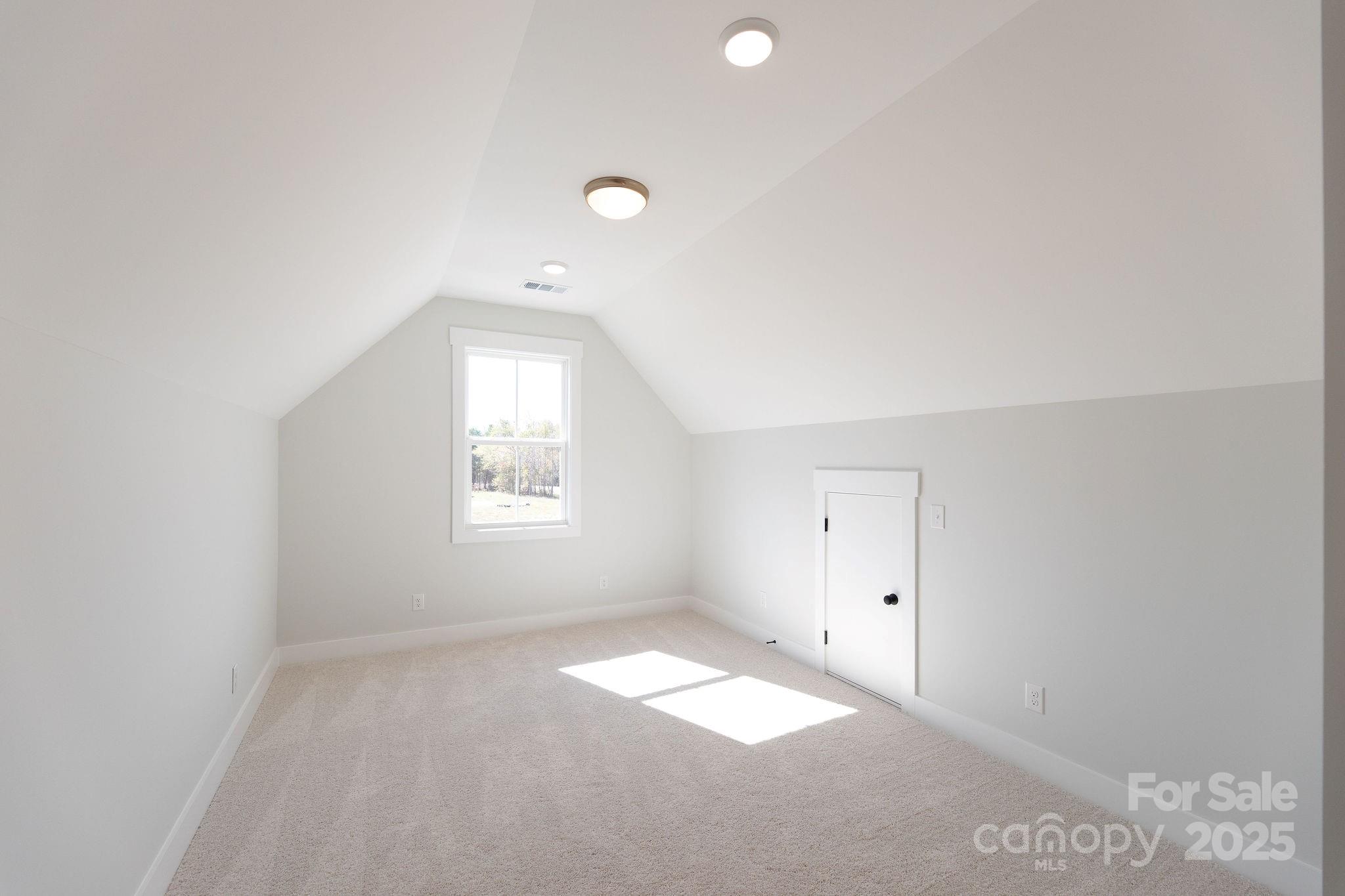 3046 Meadowcrest Drive, Unit 69 Clover, SC 29710 - Photo 25 of 42 an empty room with a window