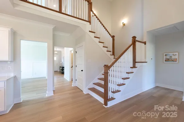 a view of entryway with wooden floor