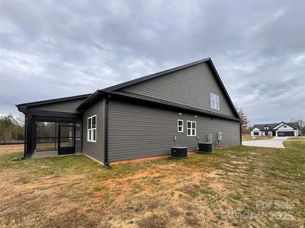 a house view with a backyard space
