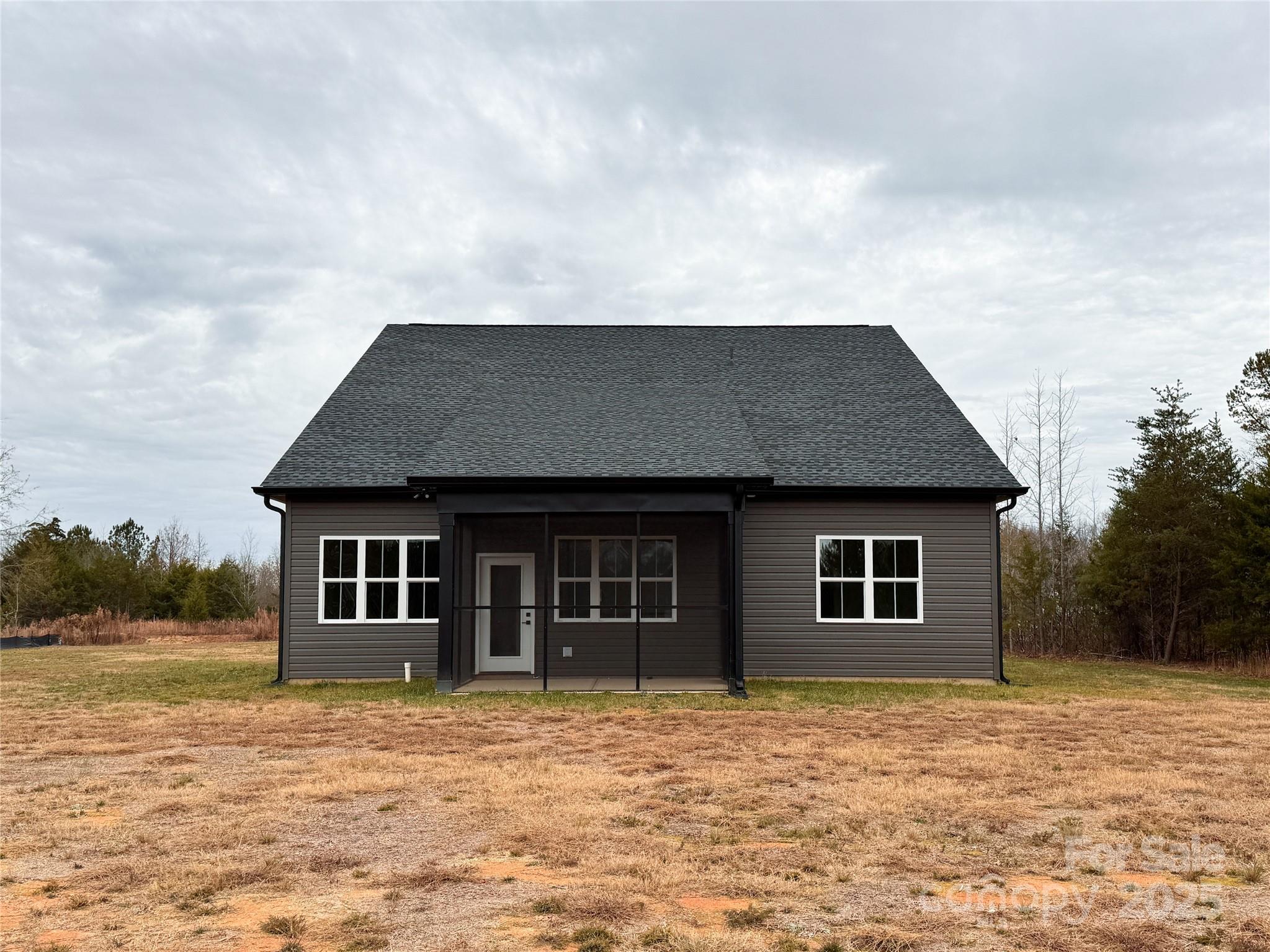 3046 Meadowcrest Drive, Unit 69 Clover, SC 29710 - Photo 6 of 42 front view of a house with a yard