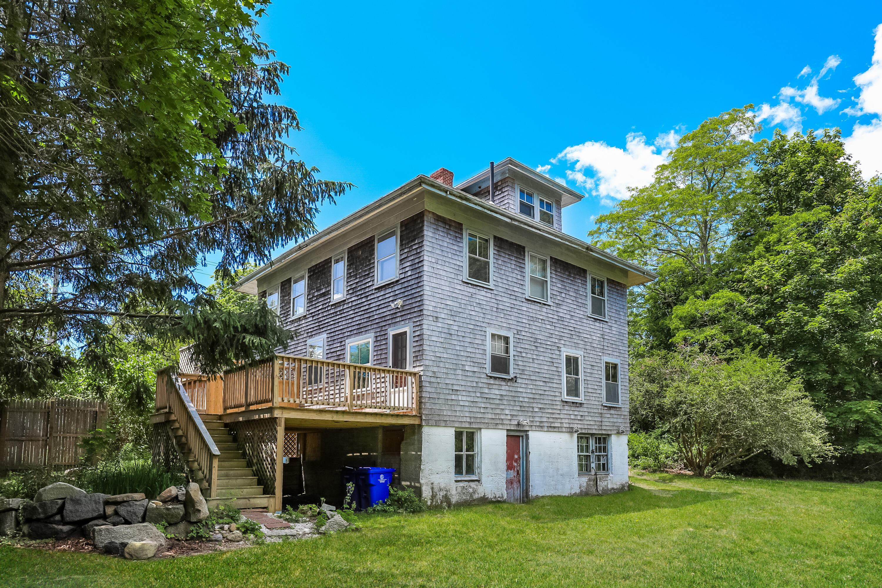 1021 Sandwich Road Sagamore, MA 02561 - Photo 15 of 18 a front view of a house with garden