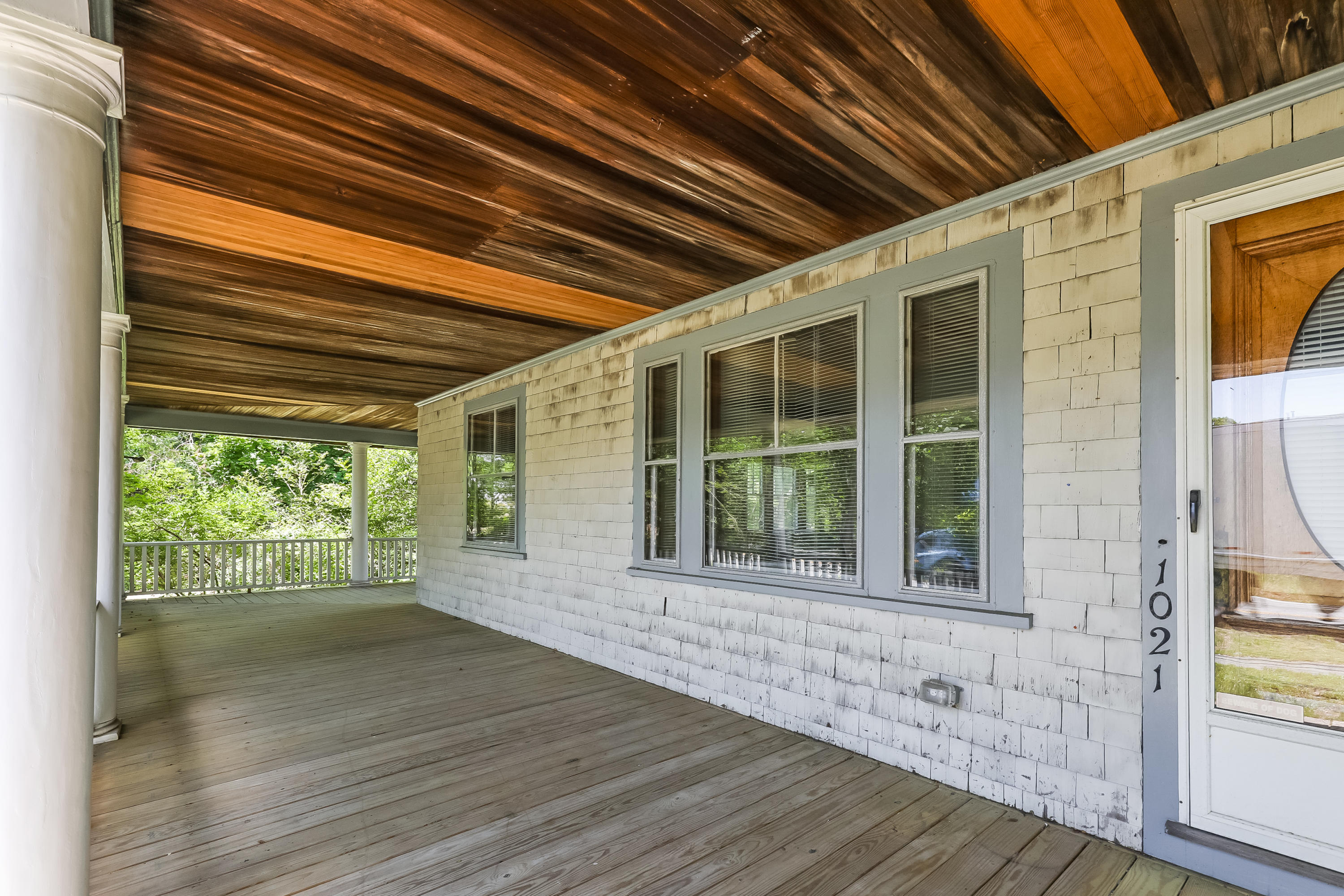 1021 Sandwich Road Sagamore, MA 02561 - Photo 3 of 18 a view of house with wooden floor and floor to ceiling window