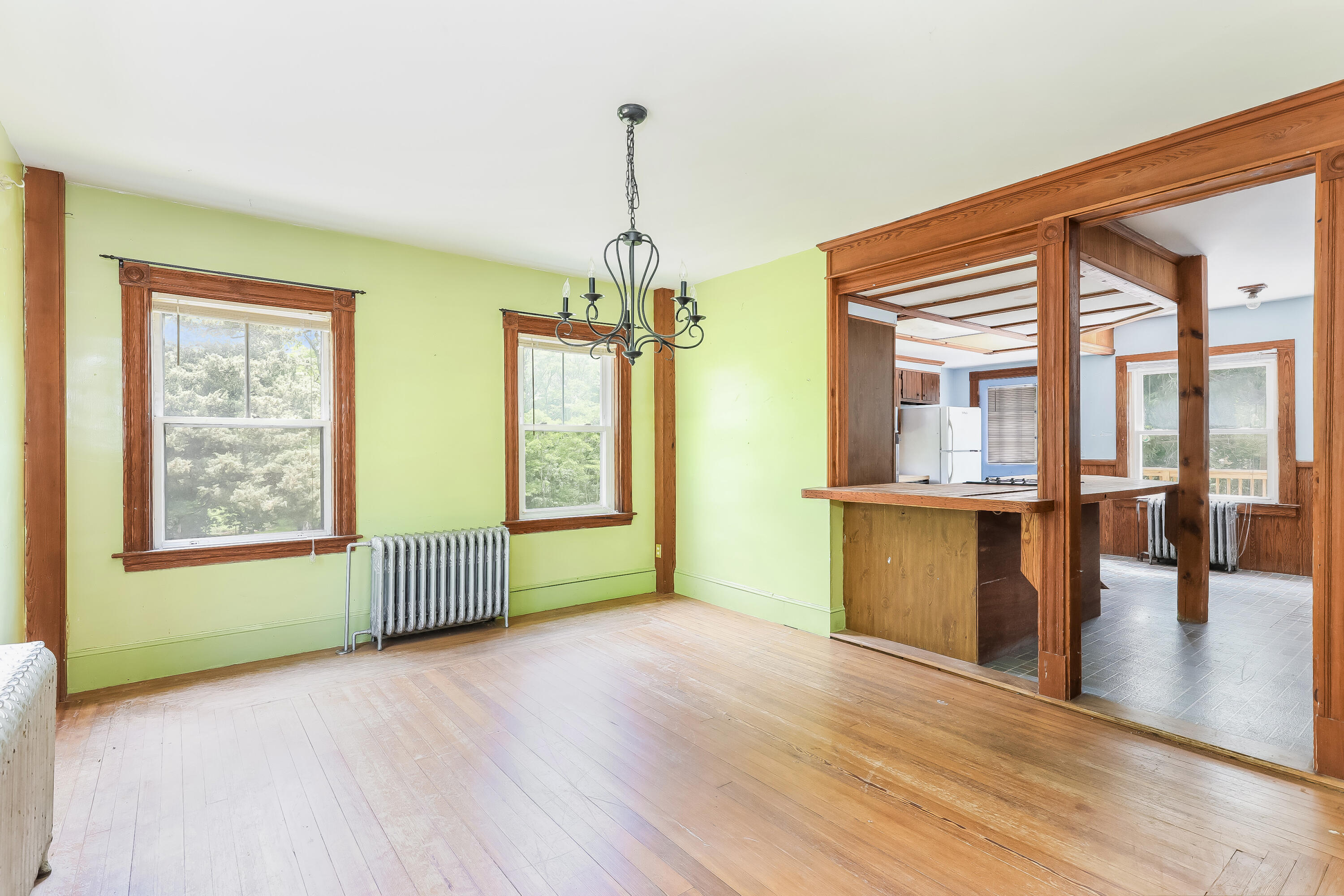 1021 Sandwich Road Sagamore, MA 02561 - Photo 6 of 18 a view of empty room with wooden floor and fan