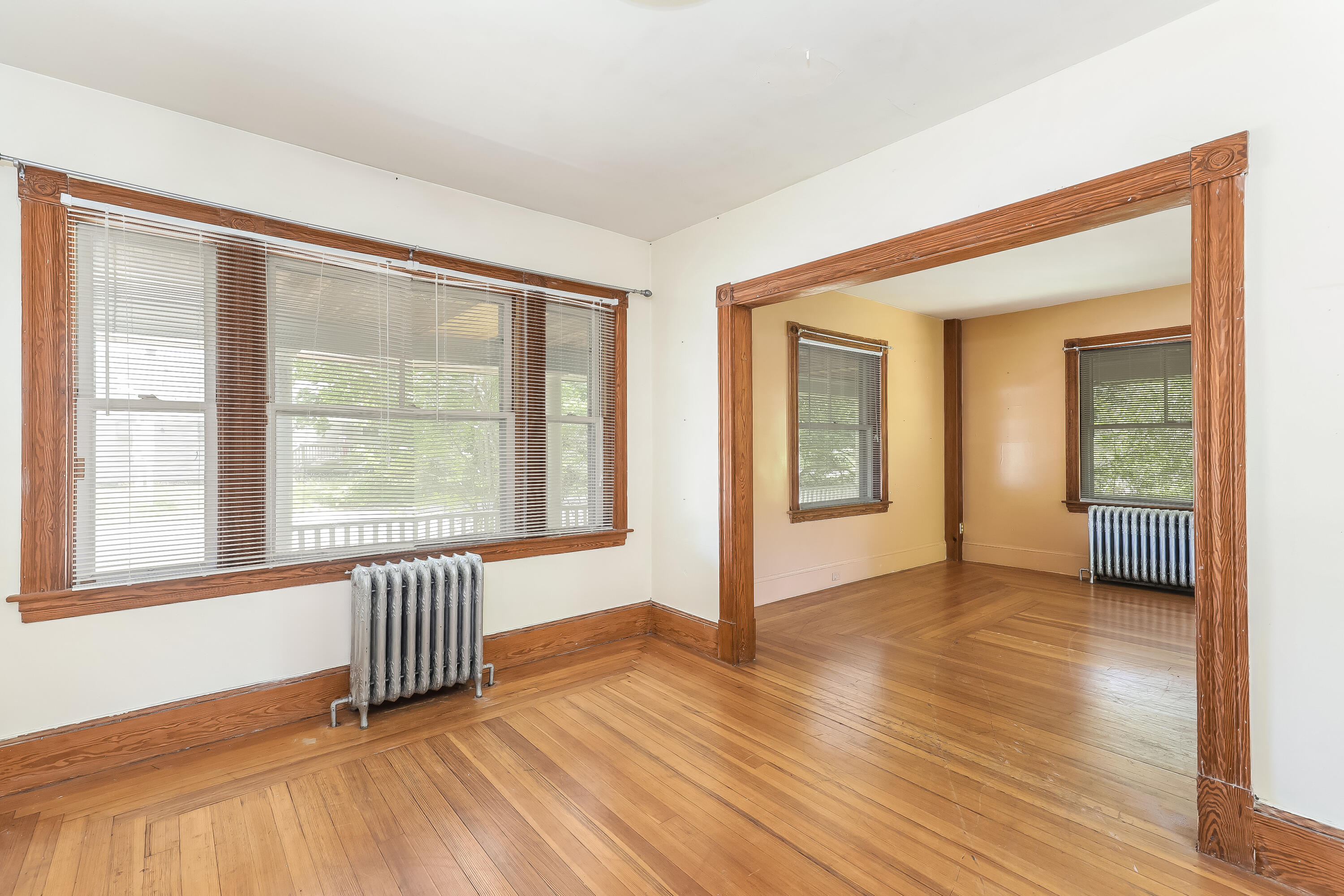 1021 Sandwich Road Sagamore, MA 02561 - Photo 8 of 18 a view of an empty room with wooden floor and a window