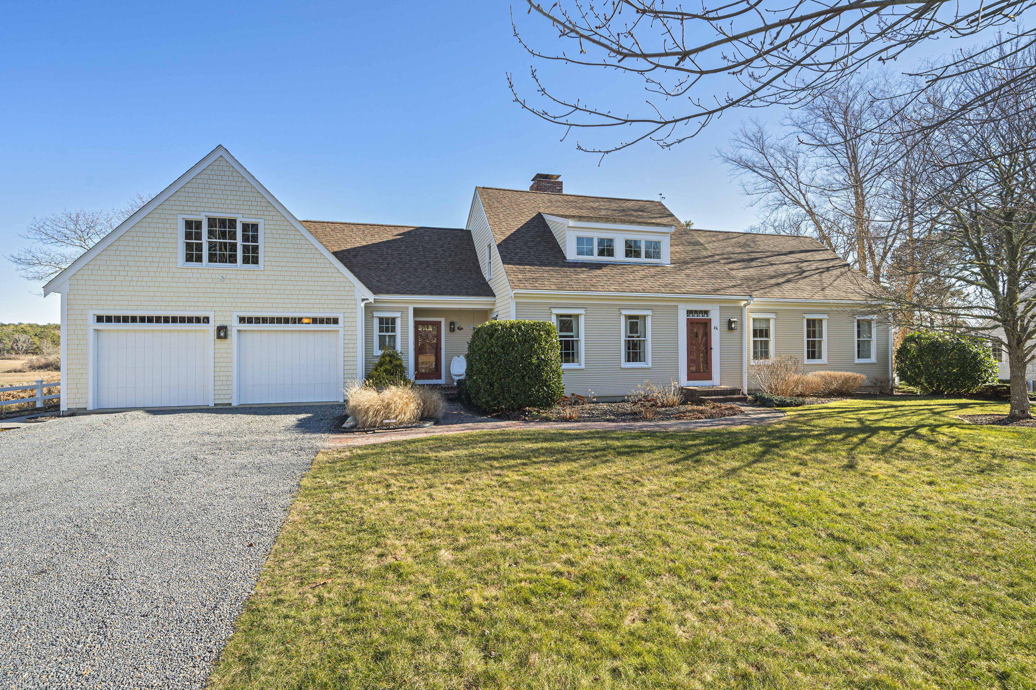a front view of a house with swimming pool