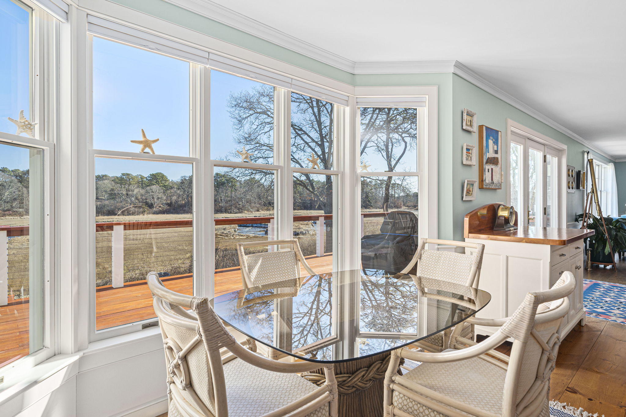 46 Lookout Road Yarmouth Port, MA 02675 - Photo 11 of 49 a dining room with furniture large windows and glass windows