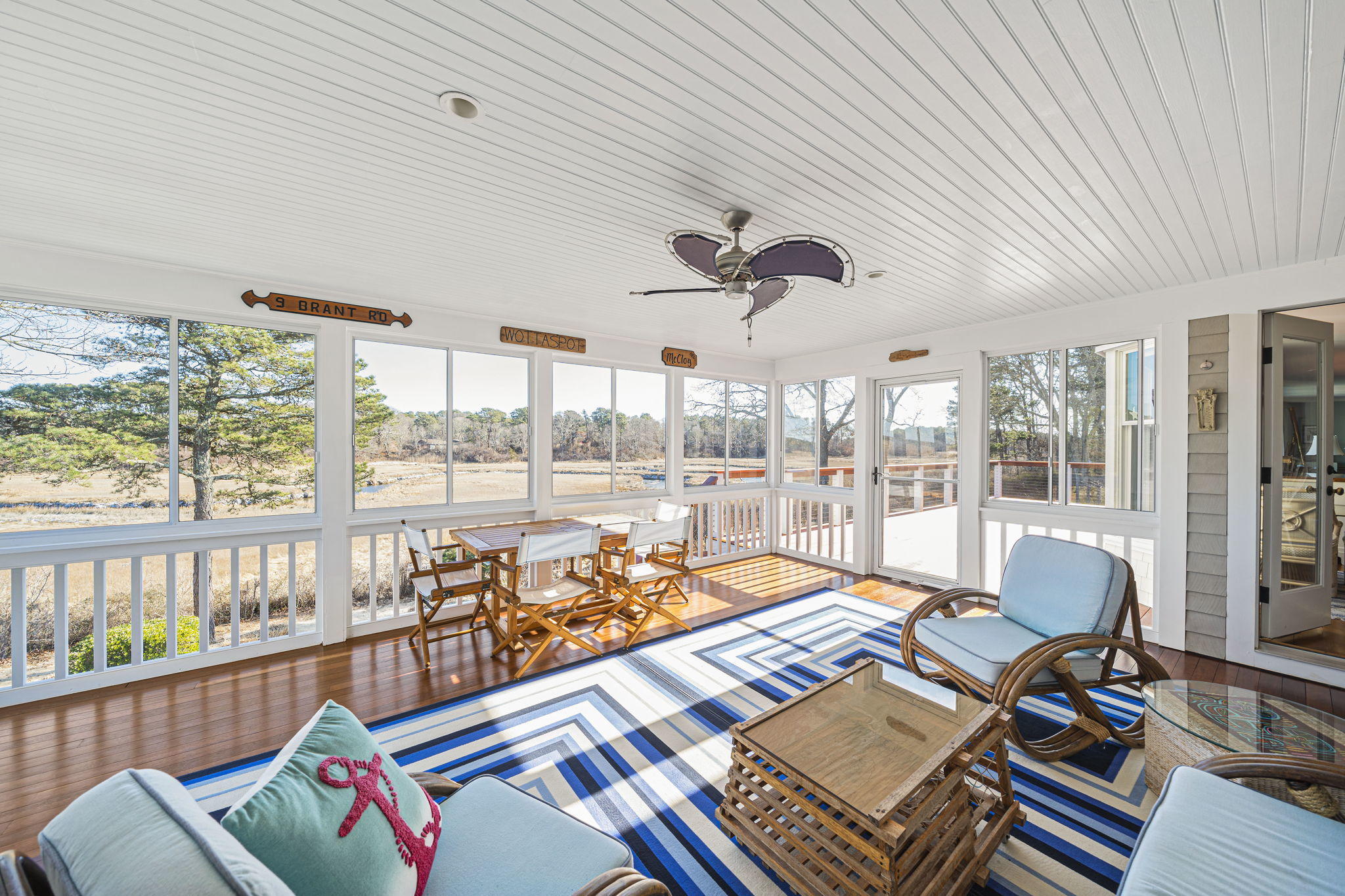 46 Lookout Road Yarmouth Port, MA 02675 - Photo 20 of 49 a living room with furniture and a floor to ceiling window