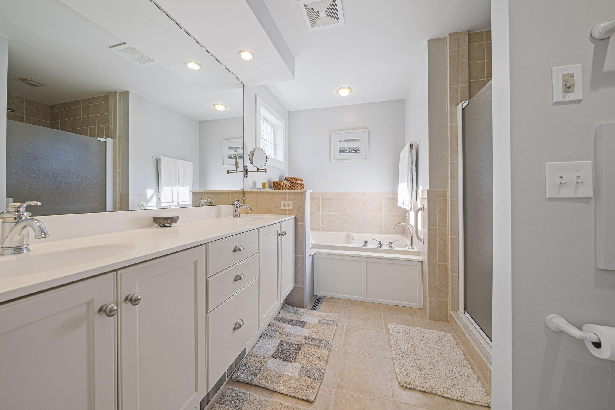 46 Lookout Road Yarmouth Port, MA 02675 - Photo 26 of 49 a spacious bathroom with a double vanity sink mirror and bathtub