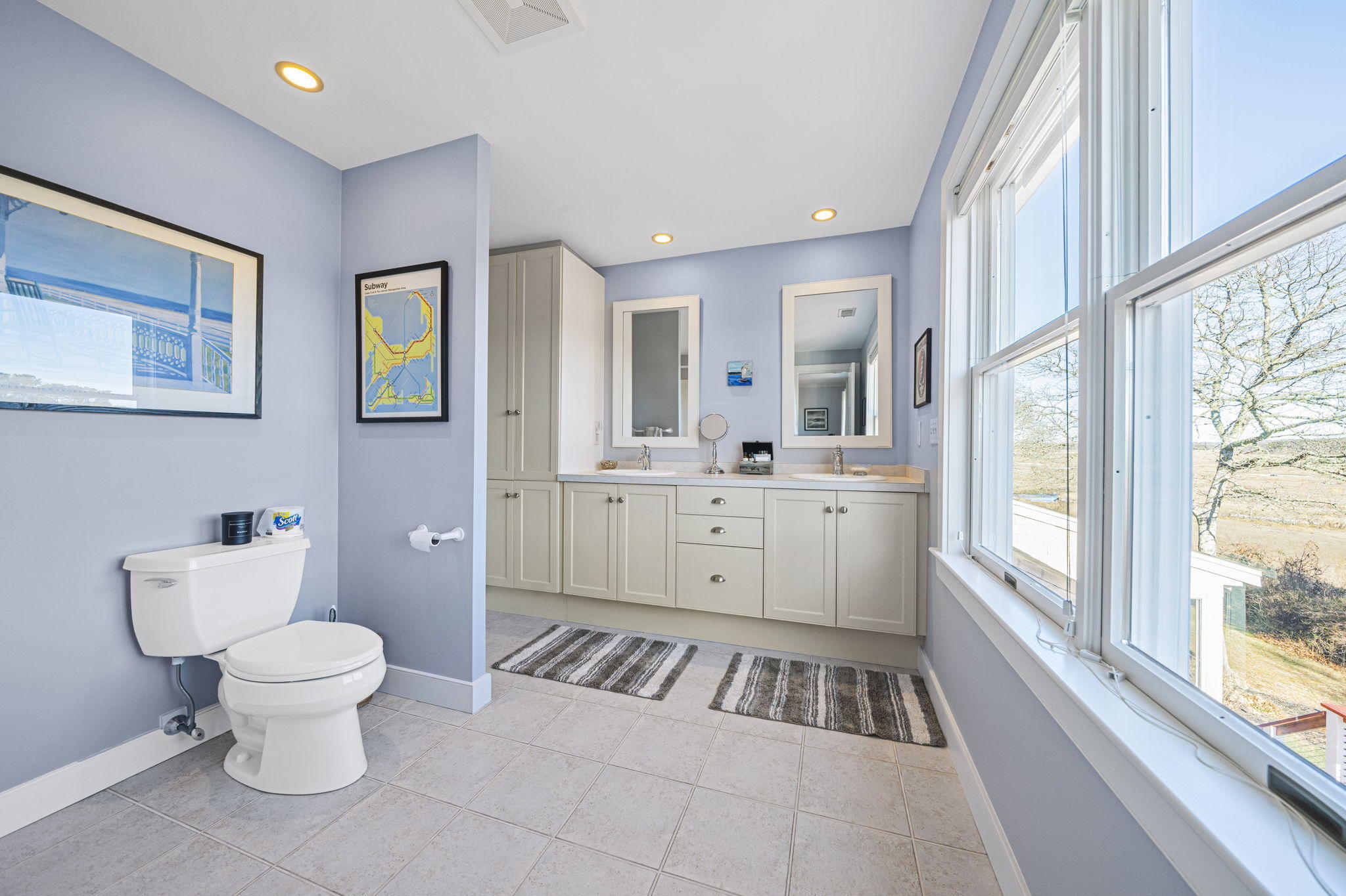 46 Lookout Road Yarmouth Port, MA 02675 - Photo 32 of 49 a spacious bathroom with a toilet sink and mirror