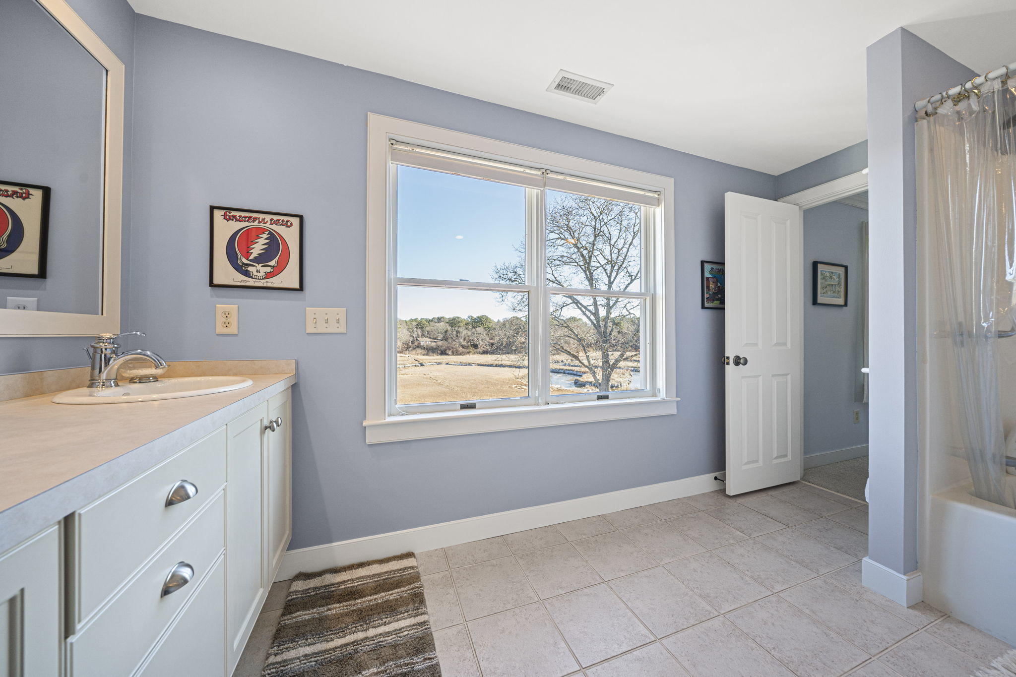 46 Lookout Road Yarmouth Port, MA 02675 - Photo 33 of 49 a spacious bathroom with a granite countertop sink and a window