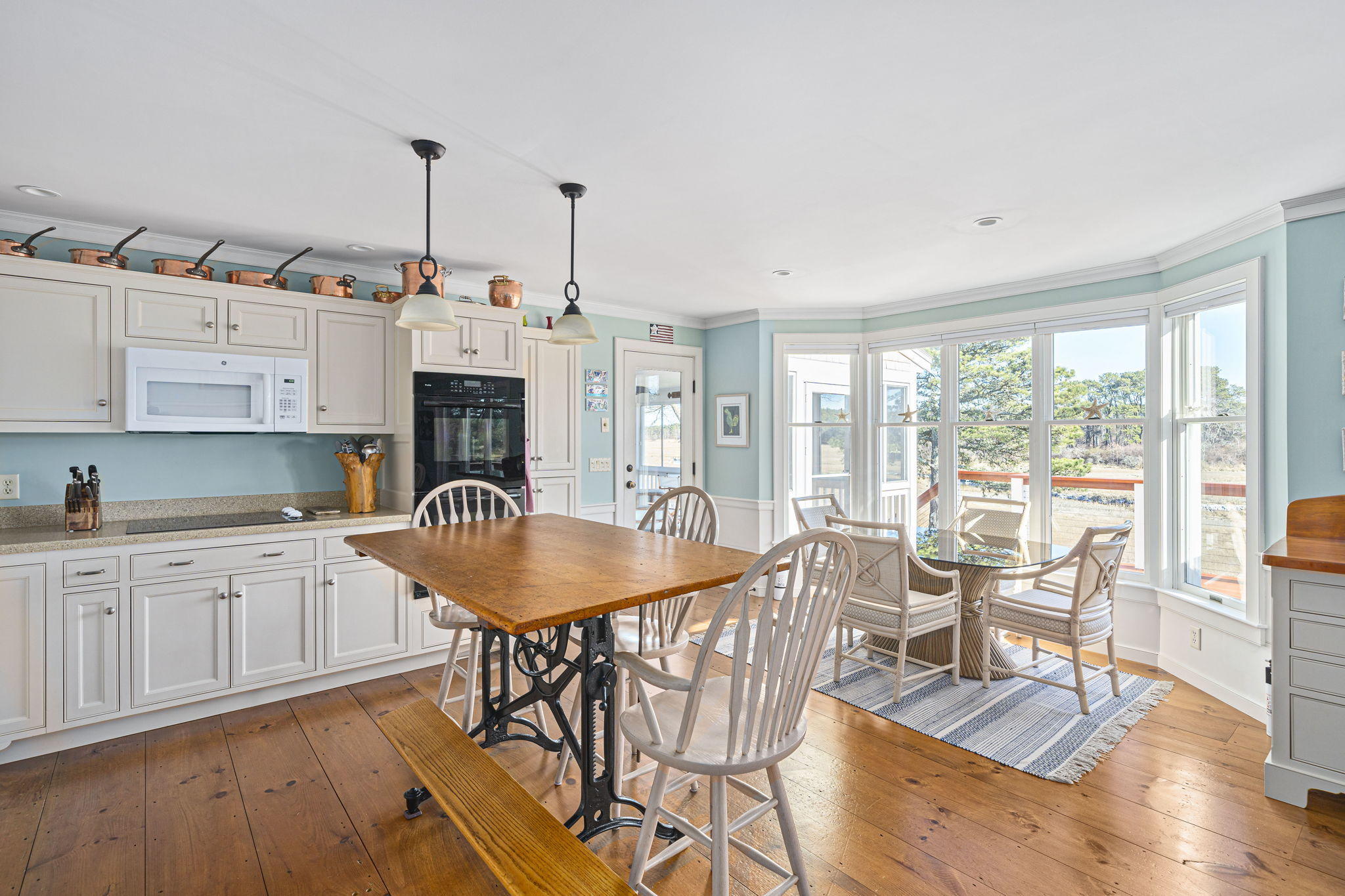 46 Lookout Road Yarmouth Port, MA 02675 - Photo 8 of 49 a living room with furniture a fireplace and wooden floor