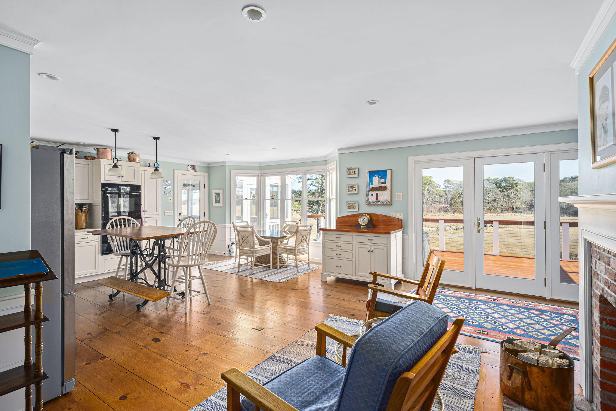 46 Lookout Road Yarmouth Port, MA 02675 - Photo 9 of 49 a living room with fireplace furniture and a table