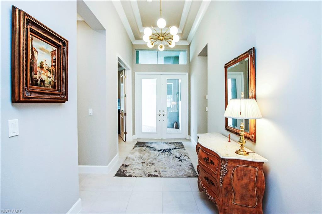 11857 Hydrangea Place Naples, FL 34120 - Photo 6 of 50 a view of hall way with furniture