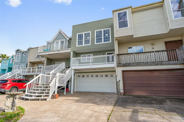 a front view of a house with balcony