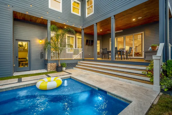 a view of a lounge chairs in the patio