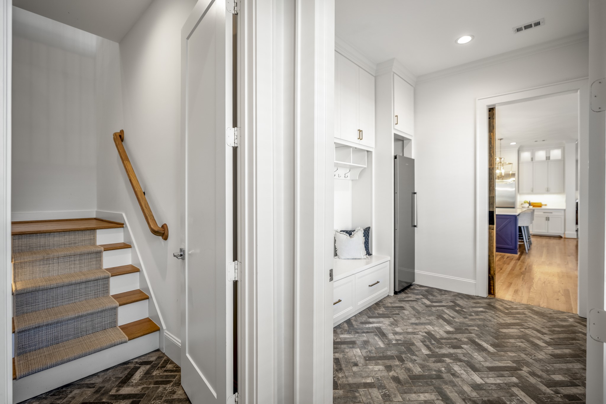 319 East 26th Street Houston, TX 77008 - Photo 36 of 50 a view of a hallway view with wooden floor and staircase