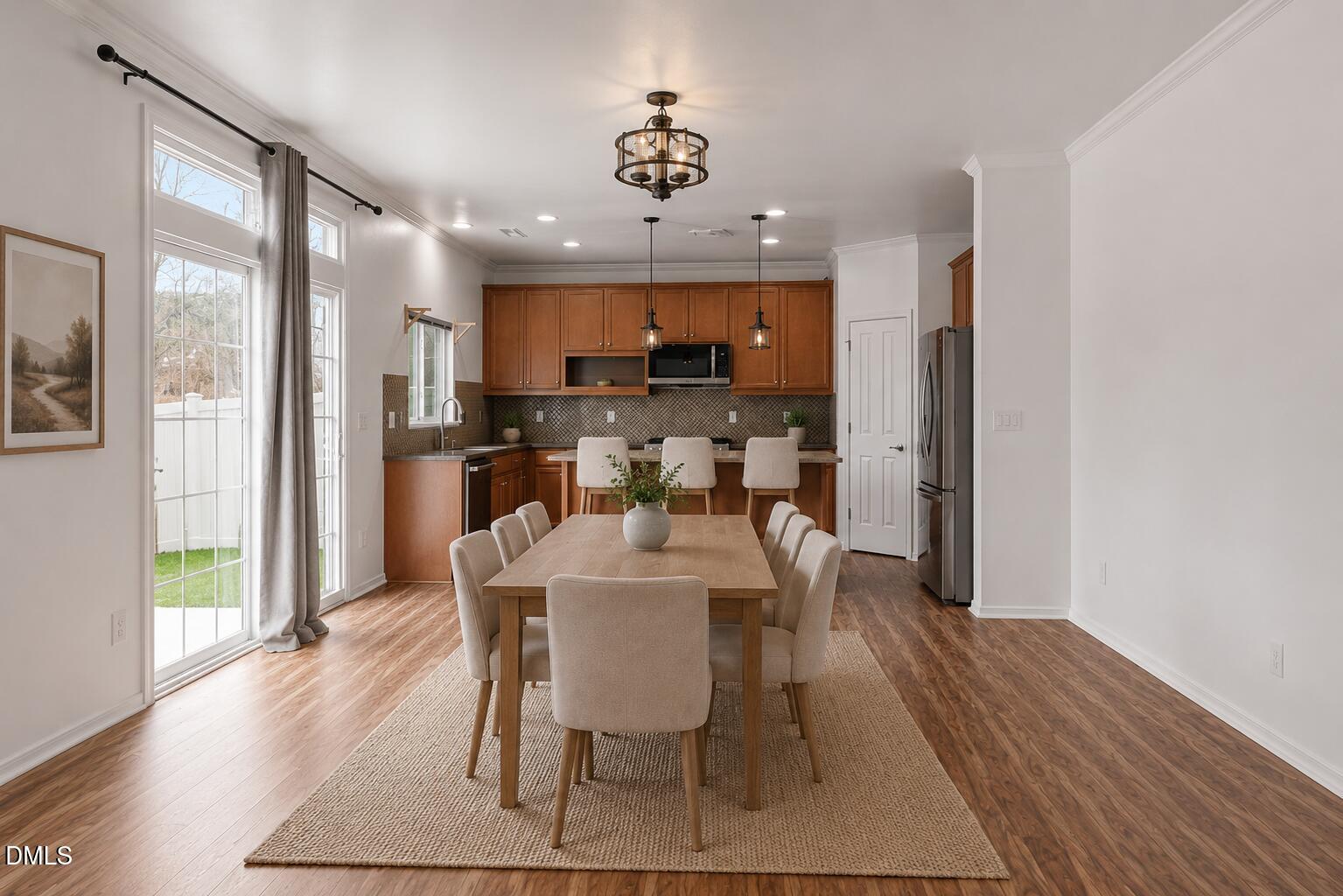 124 Daneborg Road Durham, NC 27703 - Photo 26 of 40 a view of a dining room with furniture window and wooden floor