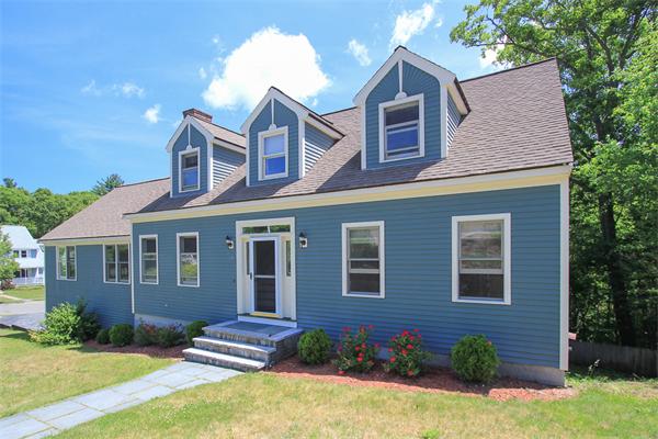 17 Old Rubbly Road Beverly, MA 01915 - Photo 1 of 17 a front view of a house with a yard and garage