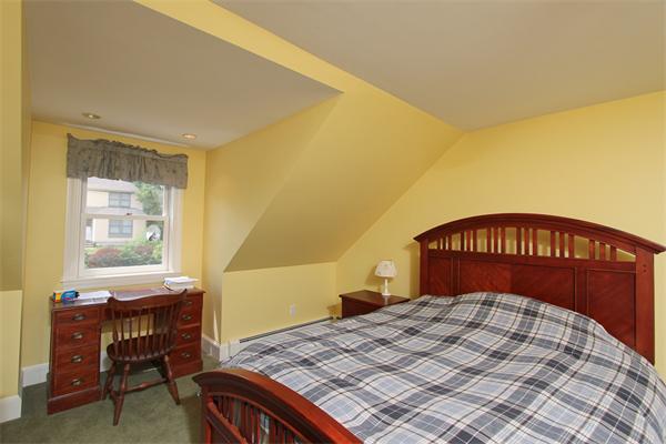 17 Old Rubbly Road Beverly, MA 01915 - Photo 11 of 17 a bedroom with a bed and a window