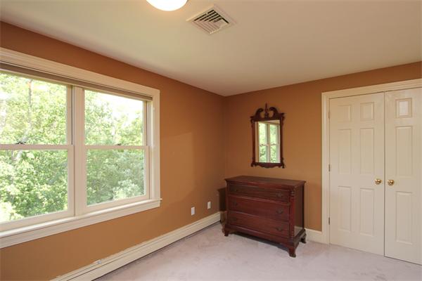 17 Old Rubbly Road Beverly, MA 01915 - Photo 13 of 17 a room with a window and a dresser