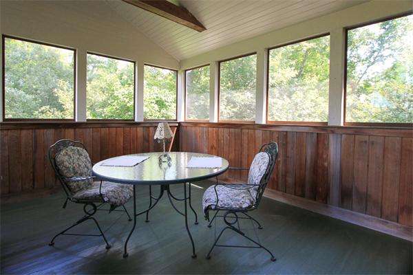 17 Old Rubbly Road Beverly, MA 01915 - Photo 16 of 17 a view of a dining room with furniture window and outside view