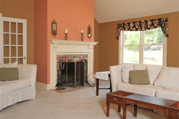 17 Old Rubbly Road Beverly, MA 01915 - Photo 4 of 17 a living room with furniture and a fireplace
